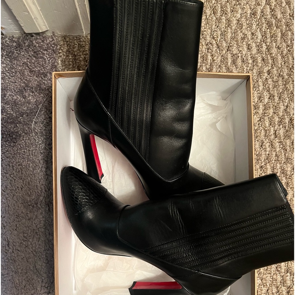 Black Christian louboutin heel boots slightly worn